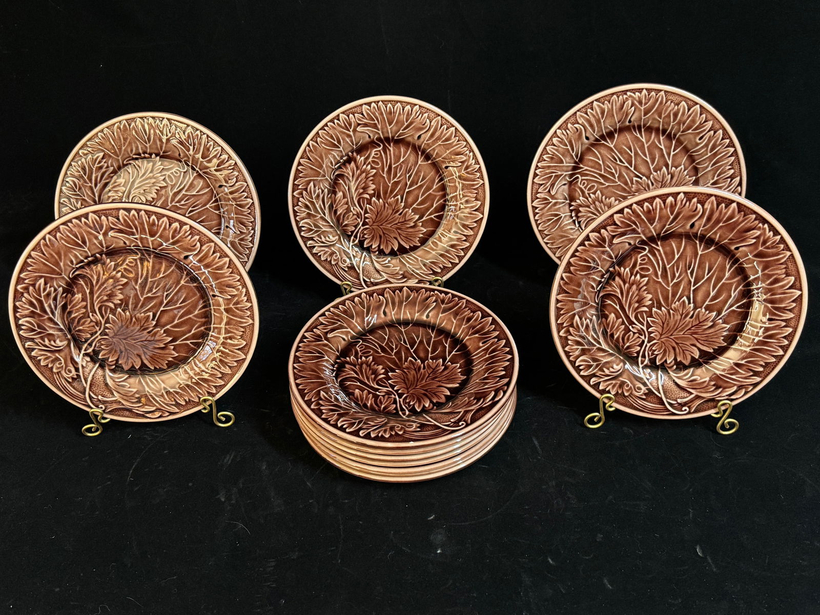 Gorgeous set of 12 Earthenware Majolica Plates: Gorgeous set of 12 Earthenware Majolica Plates from M (Molin) Charolles, France. 8" in diameter, features a beautiful stemmed oak leaf motif, in a rich chocolate brown. The mark is M Charolles, Made i
