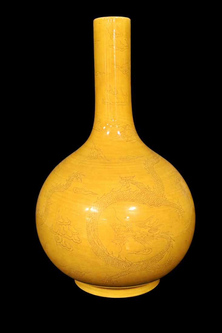 Late Qing Dynasty Imperial Yellow Porcelain Vase: TITLE : Imperial Yellow Porcelain Vase ATTRIBUTION: signed/marked double circle six character Kangxi Nian Zhi MEDIUM: Porcelain Mandarin Yellow Glaze DIMENSIONS: H.13 x W.8 inches CIRCA: Late Qing Dyn