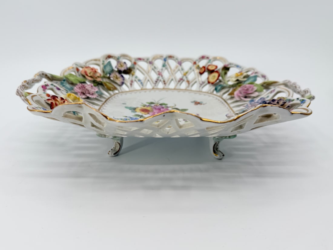 Delicate Footed SP Dresden mark serving bowl, with applied flowers and pierced sides: TITLE: Single Delicate Footed SP Dresden mark serving bowl, with applied flowers and pierced sides ATTRIBUTION: Dresden SP mark used 1902-1918 MEDIUM: Fine Hand Painted China DIMENSIONS: 11 inches W C