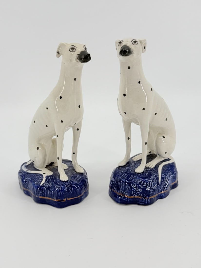 Pair of Vintage Staffordshire Style Porcelain Dalmatian Dogs: TITLE: A Pair of Vintage Staffordshire Style Porcelain Dalmatian DogsATTRIBUTION:EnglandMEDIUM: Hand painted and Fired PorcelainDIMENSIONS: 7.5 inchesCIRCA:DESCRIPTION: The subject item features a pai