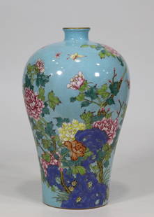 Qing Dynasty Yongzheng period blue ground famille rose flower vase: A plum vase with a blue-and-white pattern of flowers, made during the Yongzheng reign of the Qing Dynasty, 28 cm high and 15.5 cm wide, in good condition.Provenance:From an old Norwegian private colle