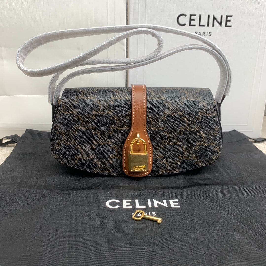 Celine mini Tabou Clutch onStrap: The mini Tabou Clutch on Strap features a modern, casual, and slightly edgy design, perfect for pairing with various autumn and winter outfits. Made with TRIOMPHE Canvas logo leather and fabric lining