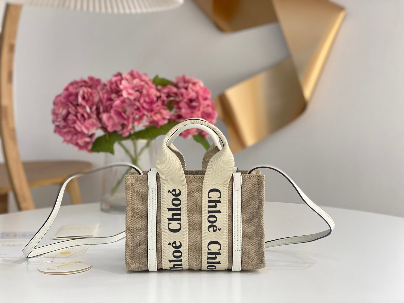 Chloe Tote Bag, Woody Mini: Mini white Chloe Tote Bag, Woody mini shoulder strap version. This adorable Woody tote bag features a striped linen body (different from the classic cloth bag material, a smaller version with white we