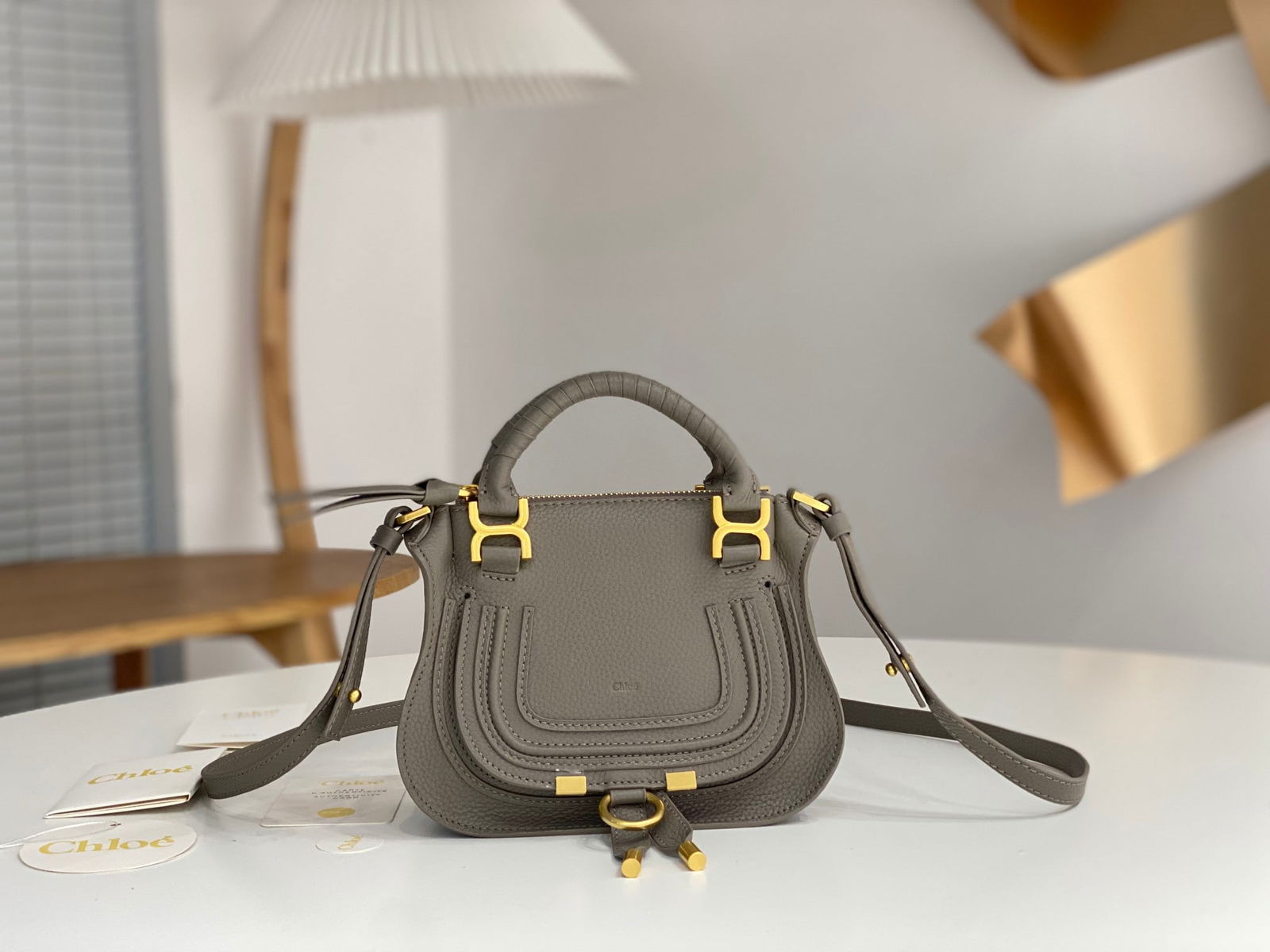 Chloe x Marcie: The Chloe x Marcie small dark grey classic bag is a very practical and spacious option, perfect for working women. It can easily hold a laptop, documents, iPad, daily makeup and cosmetics, a small umb