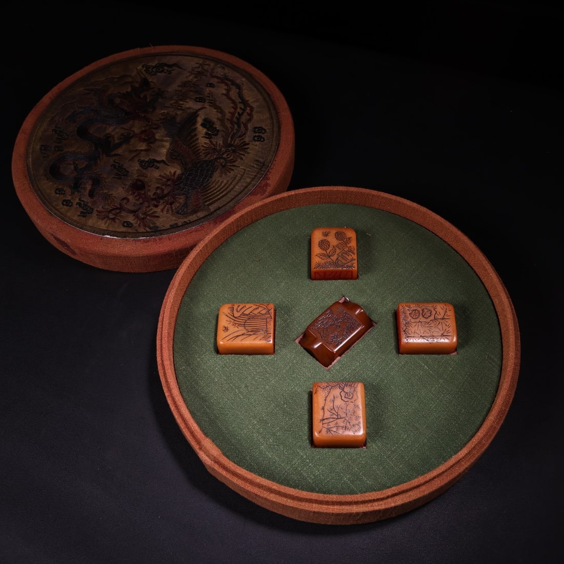 A set of Shoushan stone carved plum blossom, orchid, bamboo and chrysanthemum seals (1 of 9)