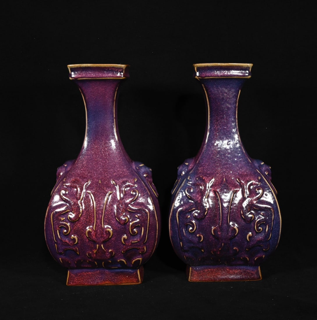A pair of Song Dynasty Jun ware rose-purple glazed carved dragon-patterned animal-ear vases with the: Height 29.3 x 15.5 cm Provenance:From an old private collection in Cotswold, United Kingdom.? Our cooperative logistics services provider expertly handles both domestic and global shipping arrangement