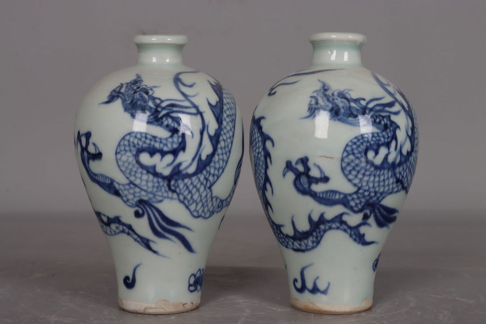 A pair of Yuan Dynasty blue and white porcelain plum vases with dragon designs (1 of 9)