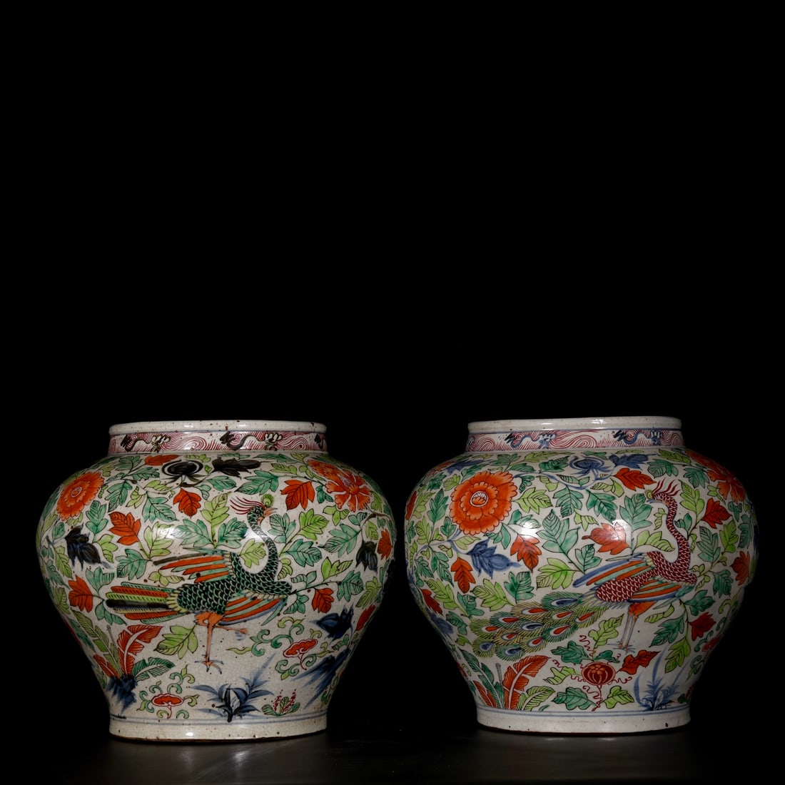 Yuan Dynasty polychrome jar with peacock and peony design: 30 cm high, 36 cm in diameter Provenance:A notable private collector in Kensington, London, United Kingdom. Our cooperative logistics services provider expertly handles both domestic and global shippi