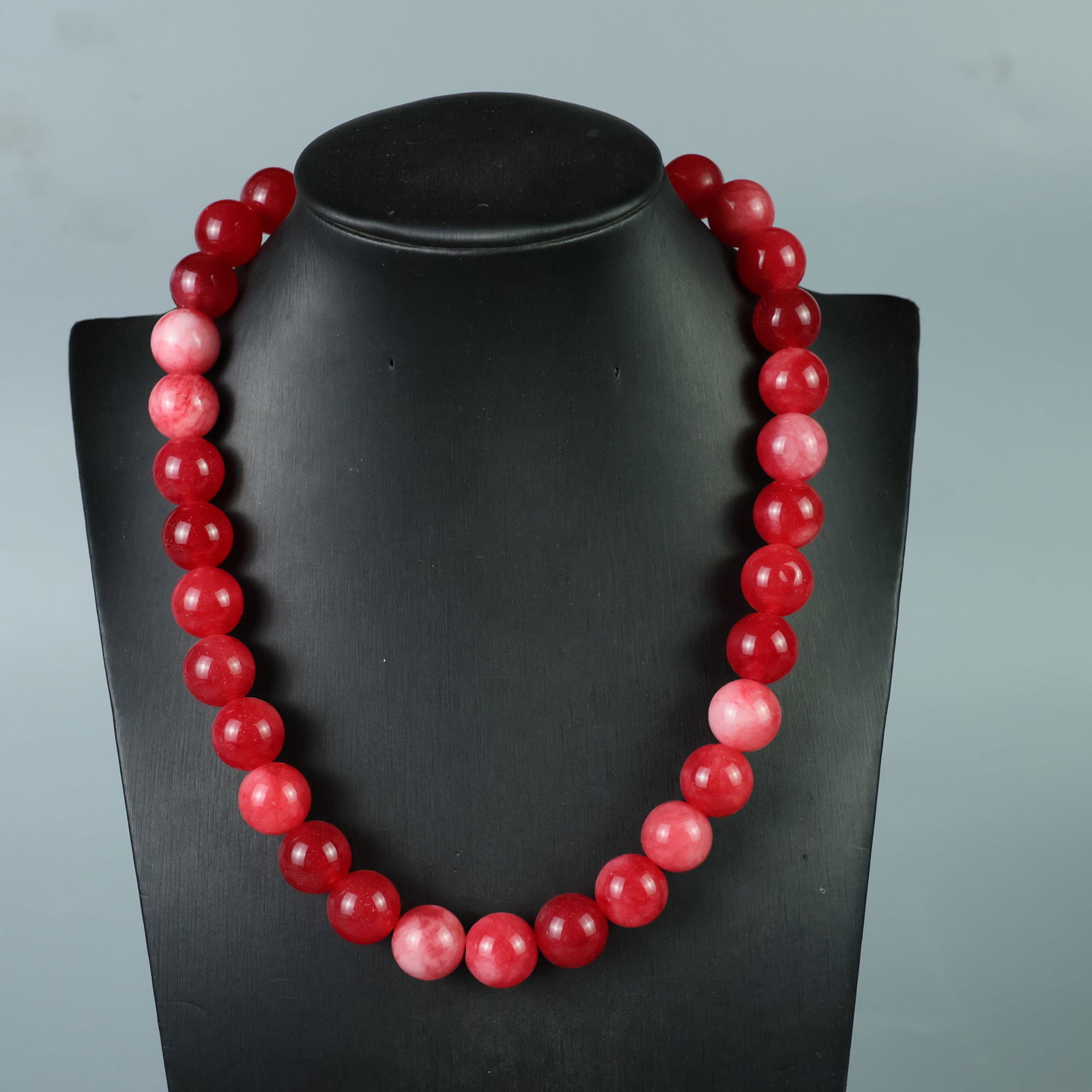 Perfect high-ice finely carved necklace: This exquisitely carved necklace features a pure, rich, clean, and translucent base with a strong fluorescence and exceptional rigidity. Its icy, translucent appearance and perfect translucency make i