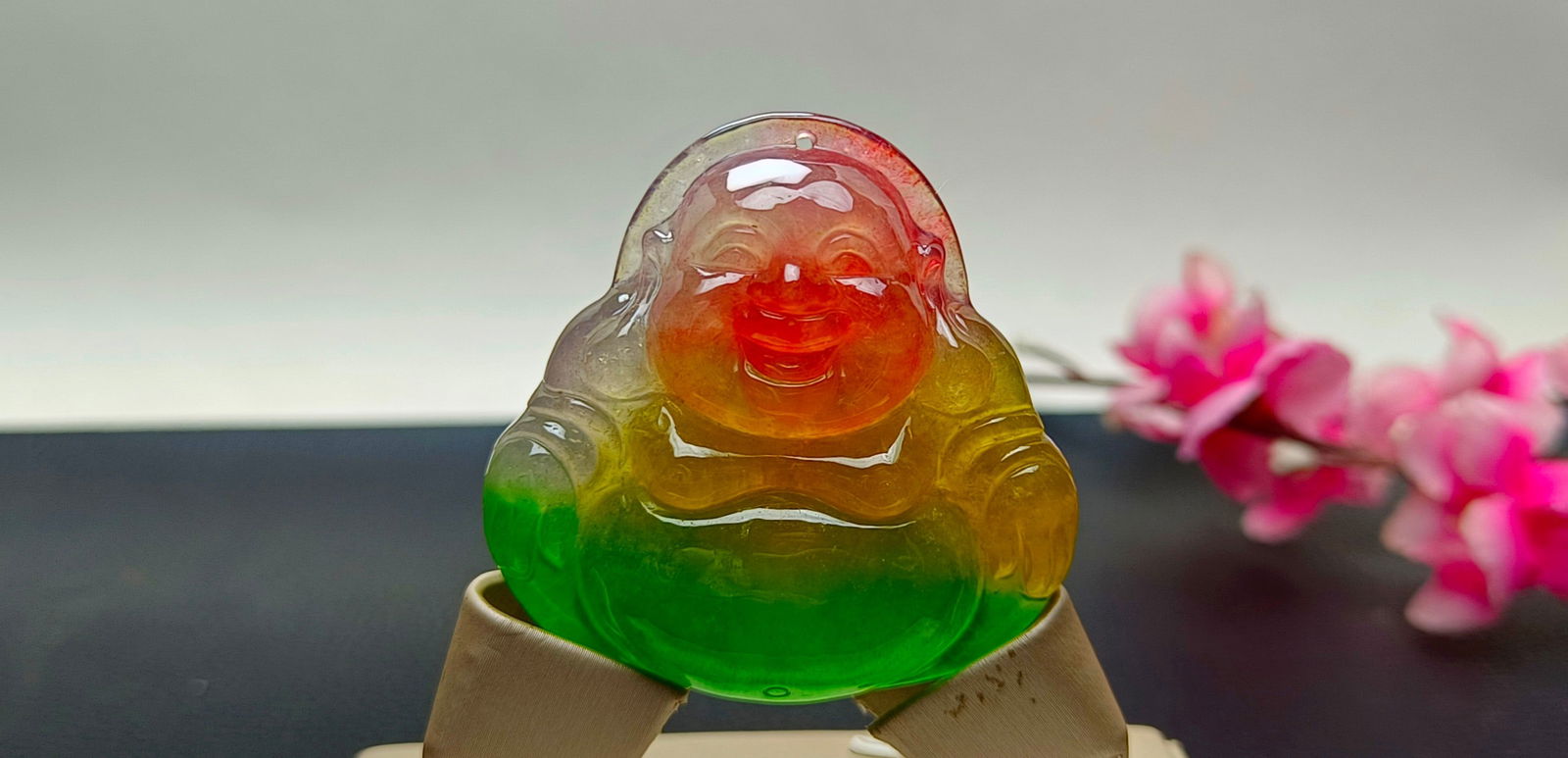 Top-grade dragon stone variety, colorful, extra-large and extra-thick jadeite Maitreya Buddha: Top-grade dragon stone type, multicolored, extra-large and extra-thick jadeite Maitreya Buddha, excellent translucency, absolutely perfect, can withstand ultraviolet light. Provenance:Private collecti