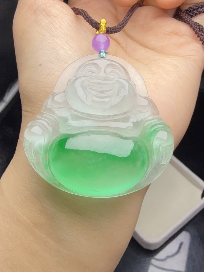 Jadeite Buddha pendant, icy variety with floating green hues. (1 of 9)