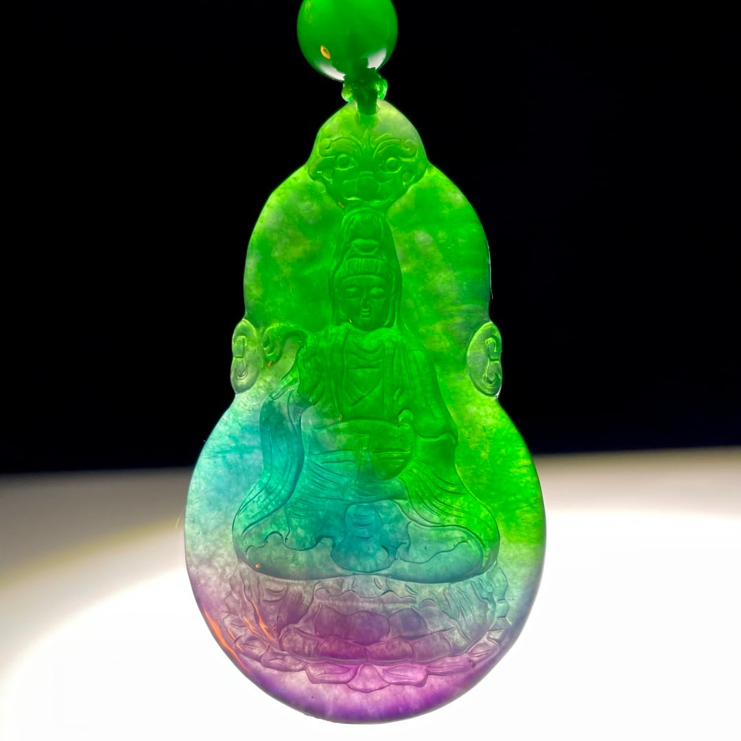 Old Collection of High-Ice Qing Dynasty Jadeite Colorful Guanyin Pendant: Old Collection of High-Ice Qing Dynasty Jadeite Colorful Guanyin Pendant Provenance:from the collection of George Stopher, Kent, purchased from P&M Waldo Antiques, London. Our cooperative logistics