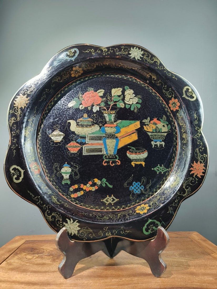 The museum's collection of gilded and painted antique lacquerware plates symbolizes wealth and (1 of 9)