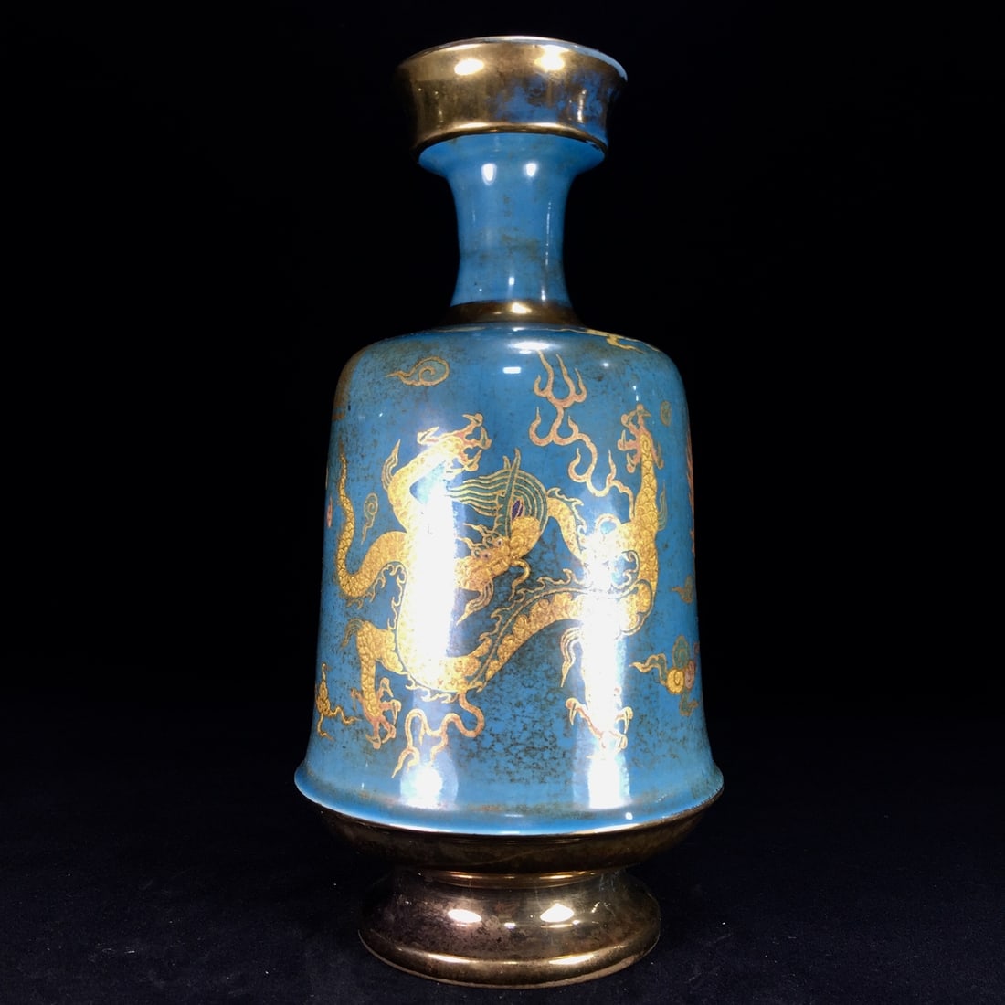 A Song Dynasty Ding ware plate with patina and gilt decoration.: A Song Dynasty Ding ware vase with gilt and polychrome enamels, possessing a well-preserved patina, measuring 13.5 x 27.5 cm. Provenance:Private collection, Manchester, The United Kingdom. Our coopera