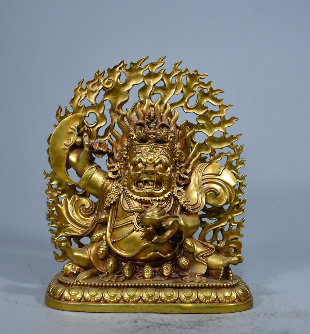 The bronze Buddha statues of Mahakala, Black Vajra, and Black Wealth God, with their large hands and (1 of 9)