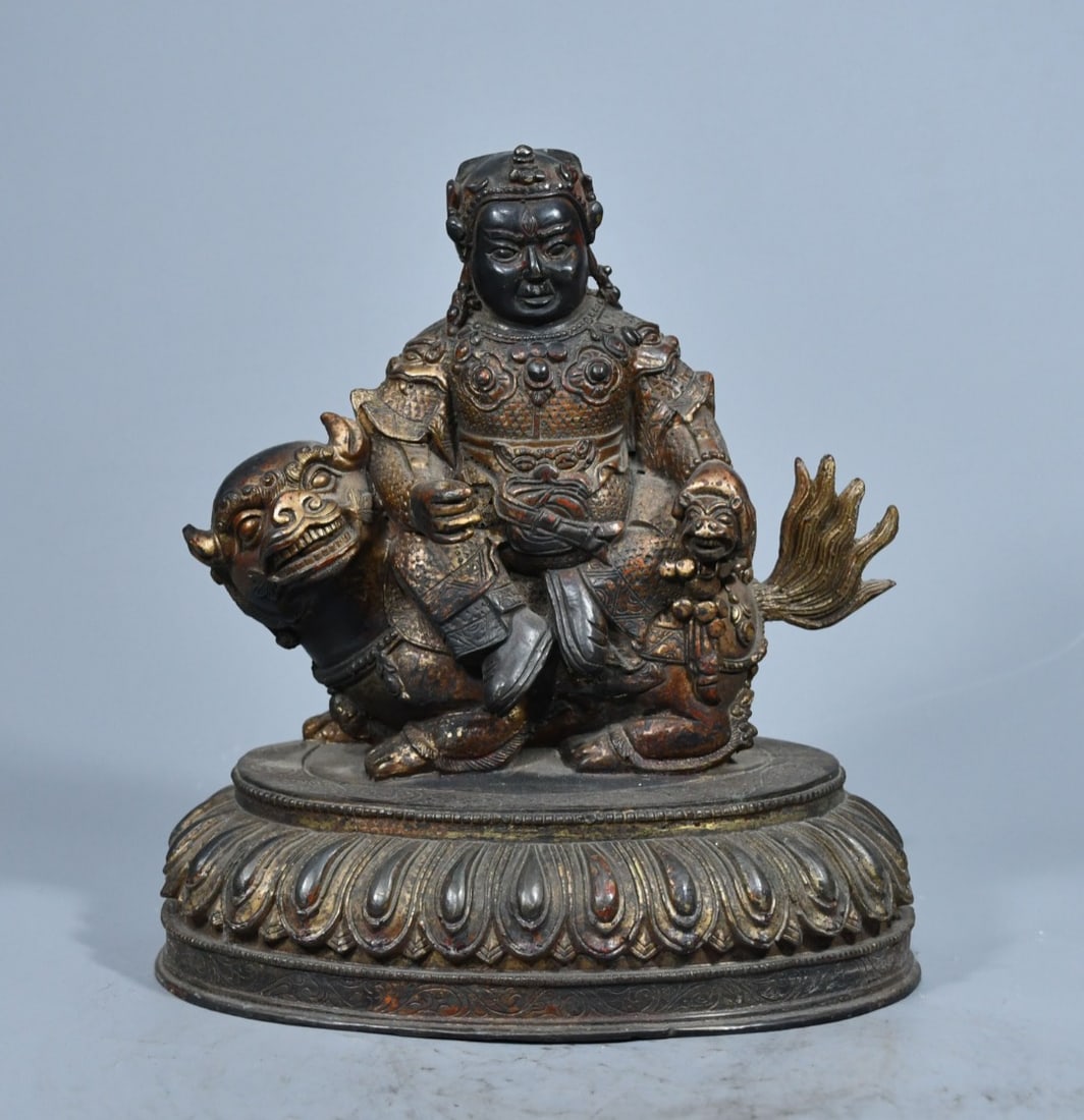 Tibetan Buddhist bronze Buddha statue, rubbing of the Treasure King and Yellow Jambhala, has a thick: Tibetan Buddhist bronze Buddha statue, rubbing of the Wealth King (or Yellow Jambhala), with a thick body, elegant color, and a rich, natural patina, exuding an antique and rustic charm. Height 22cm,