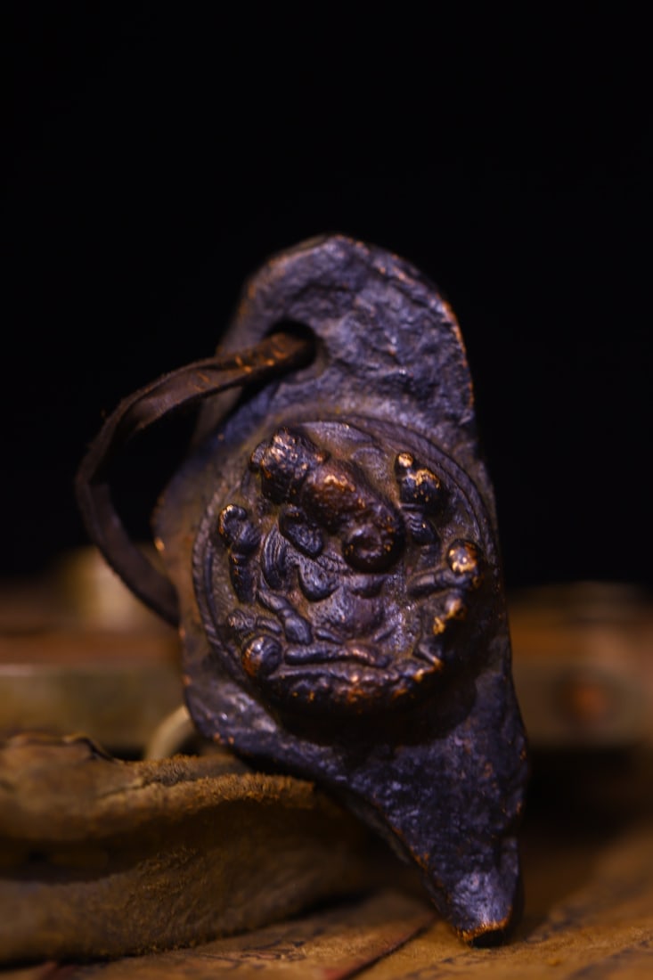 Copper-bodied, hand-hammered and engraved Buddha amulets (1 of 9)