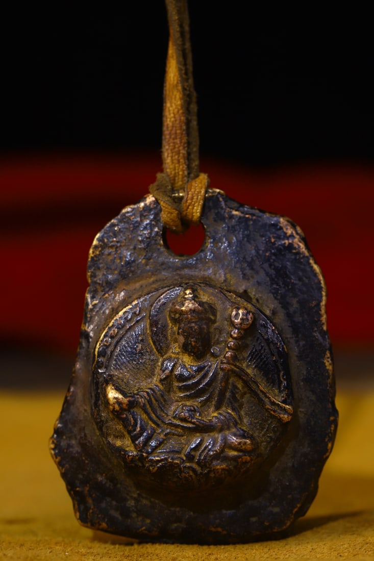 Copper-bodied, hand-hammered and engraved Buddha amulets (1 of 8)