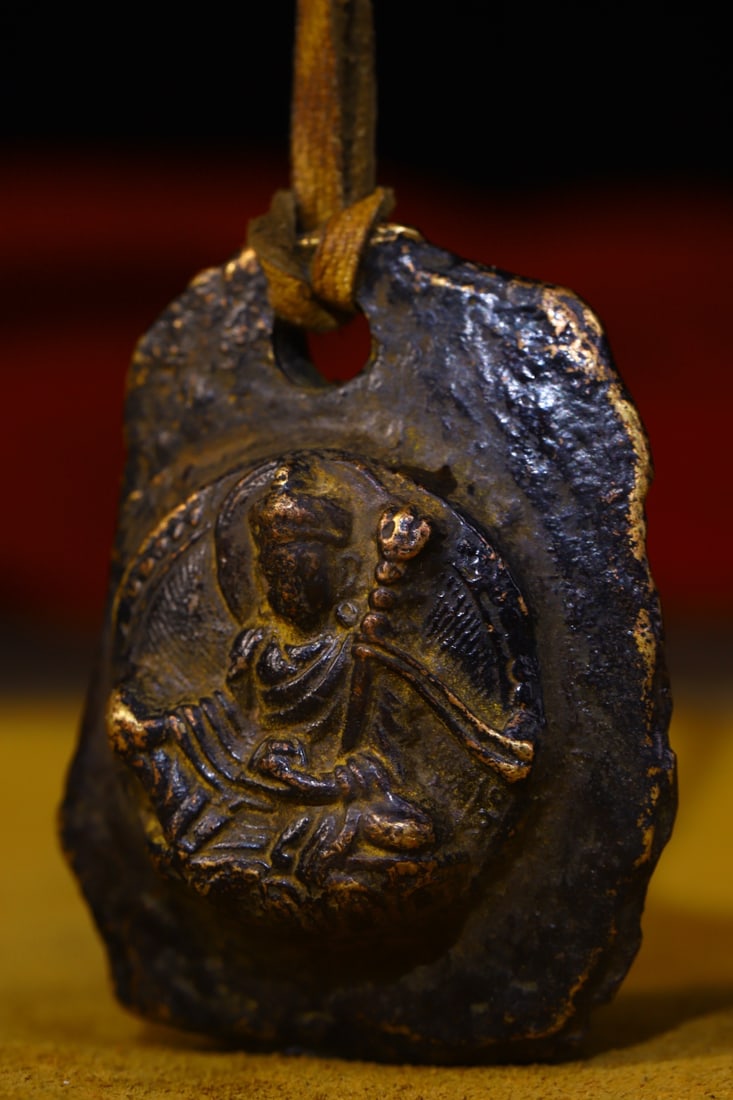 Copper-bodied, hand-hammered and engraved Buddha amulets (1 of 10)