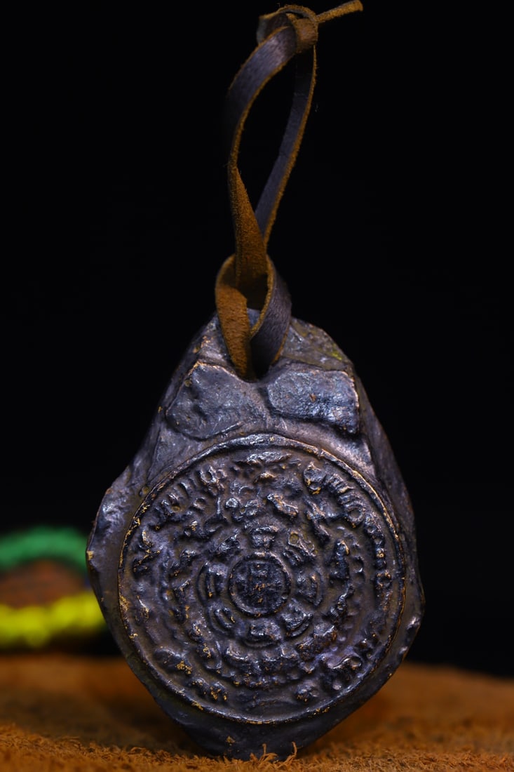 Copper-bodied, hand-hammered and engraved Buddha amulets (1 of 9)