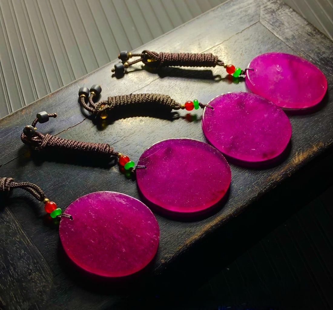 High-quality icy red jadeite pendant: High-quality, icy red jadeite pendant with a smooth, oily patina; in perfect condition. Provenance:from the collection of George Stopher, Kent, purchased from P&M Waldo Antiques, London. Our cooperati