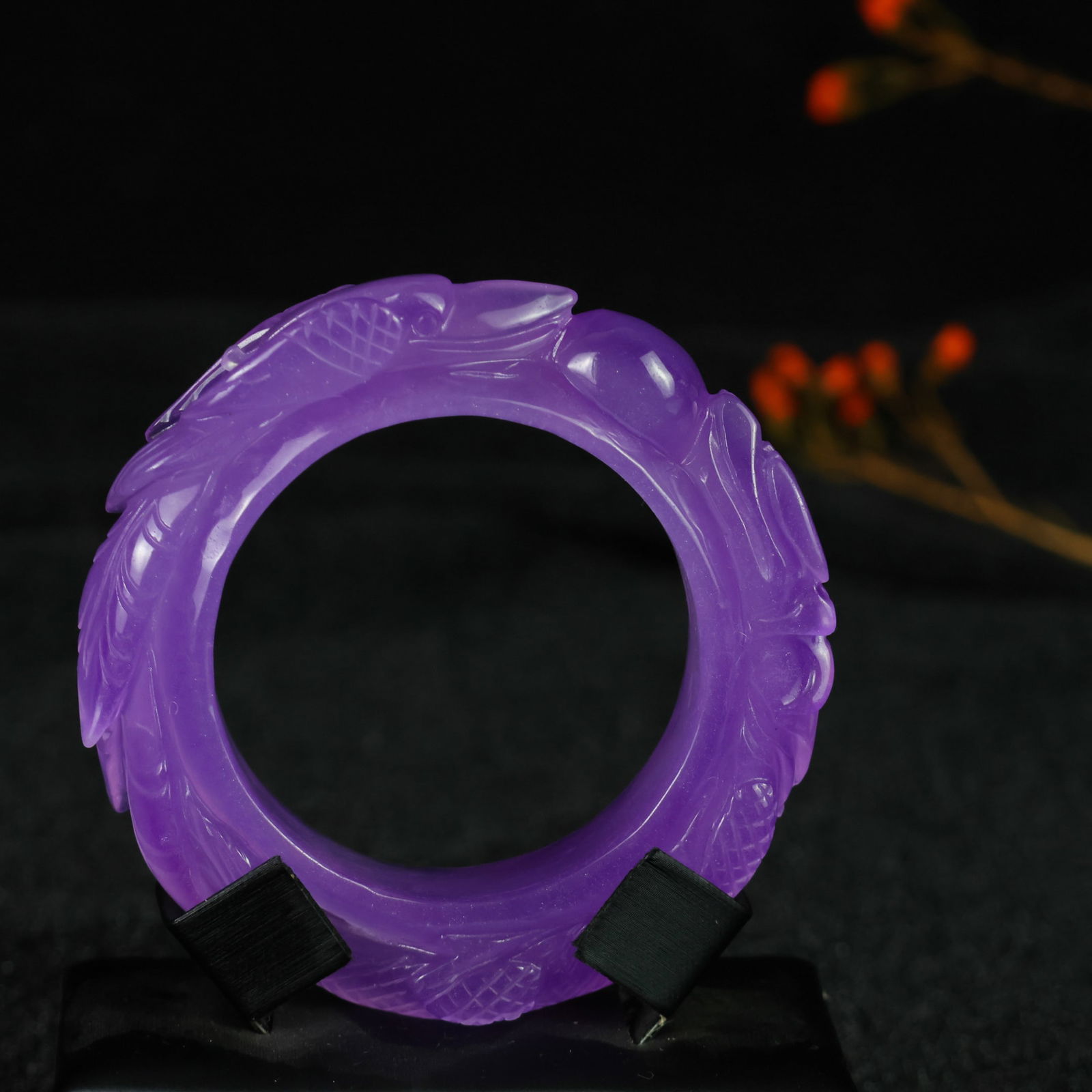 Perfectly crafted high-grade ice crystal jadeite bangle with exquisite carving.: This exquisitely carved high-grade icy jadeite bangle boasts a pure, rich, clean, and translucent base with strong fluorescence and exceptional rigidity. Its icy, luminous appearance and perfect trans