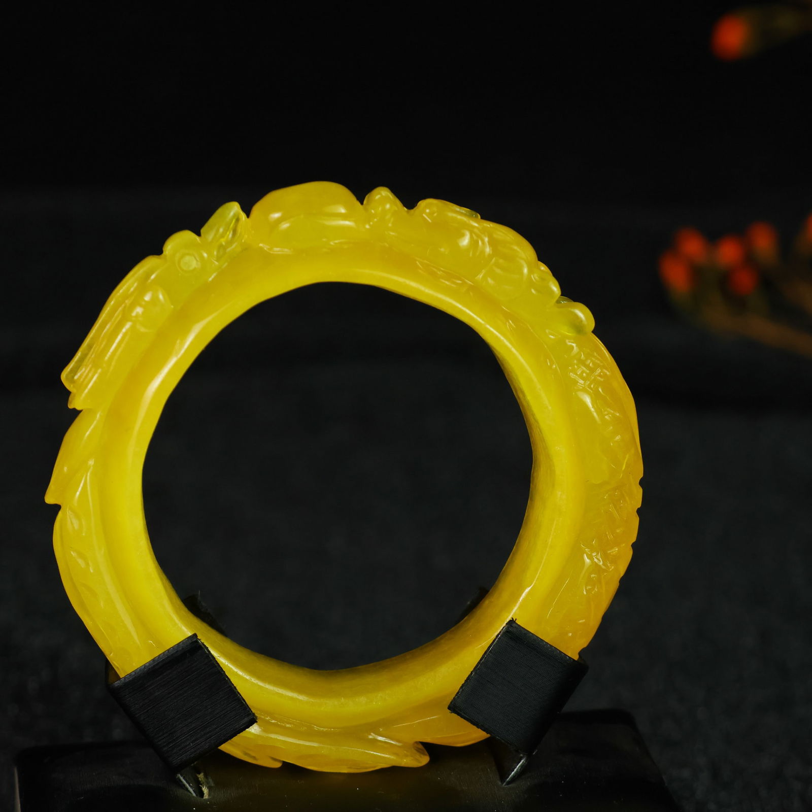 Perfectly crafted high-grade ice crystal jadeite bangle with exquisite carving.: This exquisitely carved high-grade icy jadeite bangle boasts a pure, rich, clean, and translucent base with strong fluorescence and exceptional rigidity. Its icy, luminous appearance and perfect trans