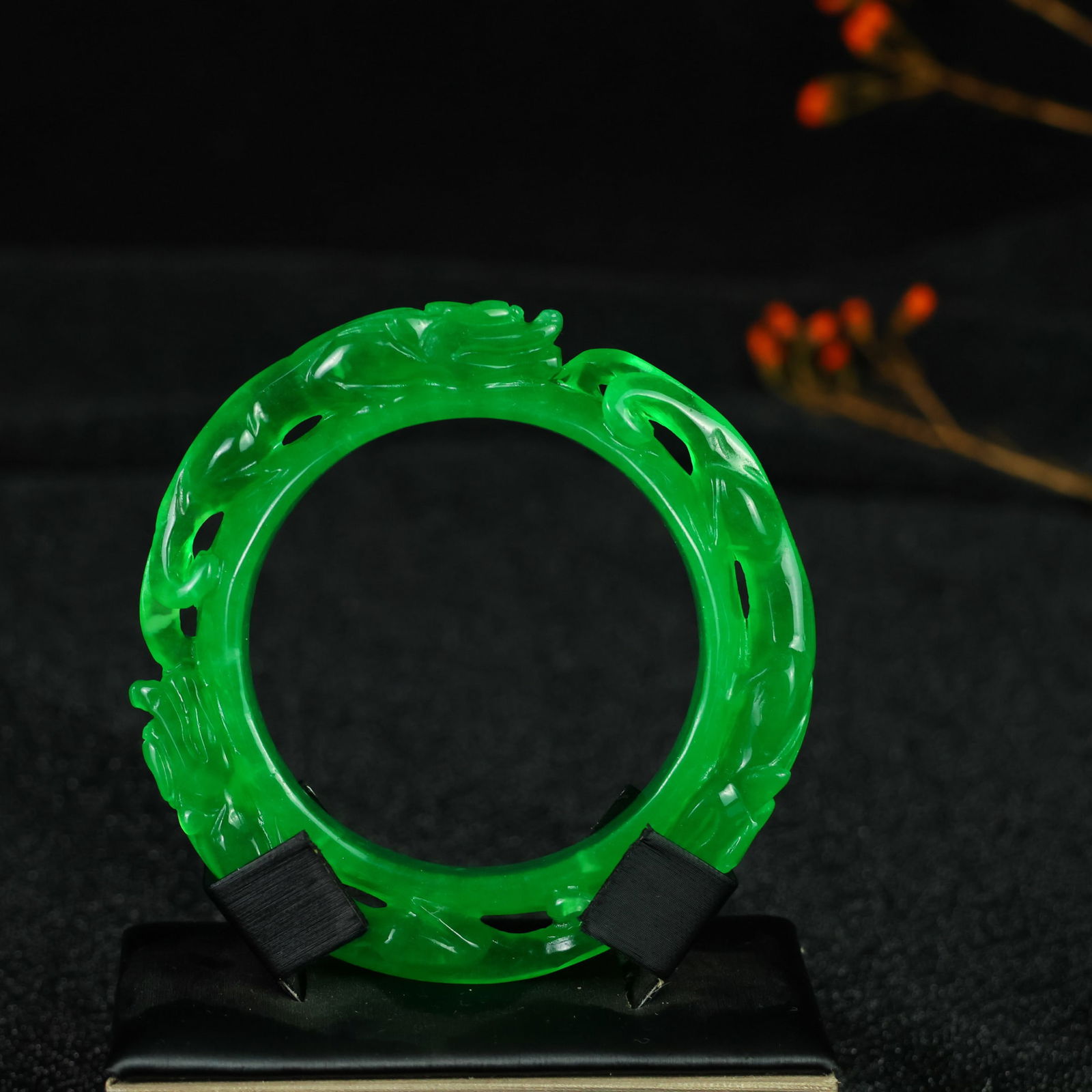Perfectly crafted high-grade ice crystal jadeite bangle with exquisite carving.: This exquisitely carved high-grade icy jadeite bangle boasts a pure, rich, clean, and translucent base with strong fluorescence and exceptional rigidity. Its icy, luminous appearance and perfect trans