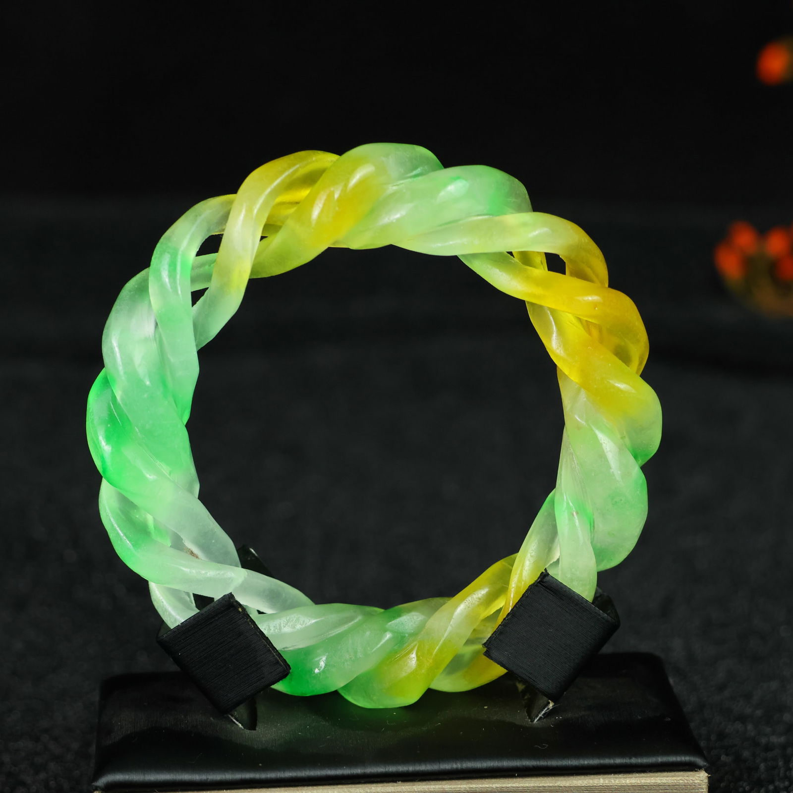 Perfectly crafted high-grade ice crystal jadeite bangle with exquisite carving.: This exquisitely carved high-grade icy jadeite bangle boasts a pure, rich, clean, and translucent base with strong fluorescence and exceptional rigidity. Its icy, luminous appearance and perfect trans