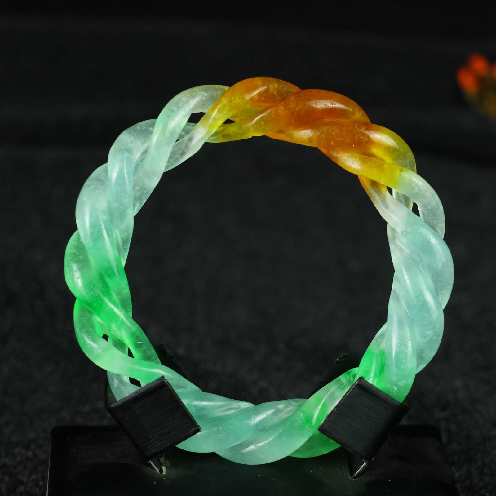 Perfectly crafted high-grade ice crystal jadeite bangle with exquisite carving.: This exquisitely carved high-grade icy jadeite bangle boasts a pure, rich, clean, and translucent base with strong fluorescence and exceptional rigidity. Its icy, luminous appearance and perfect trans
