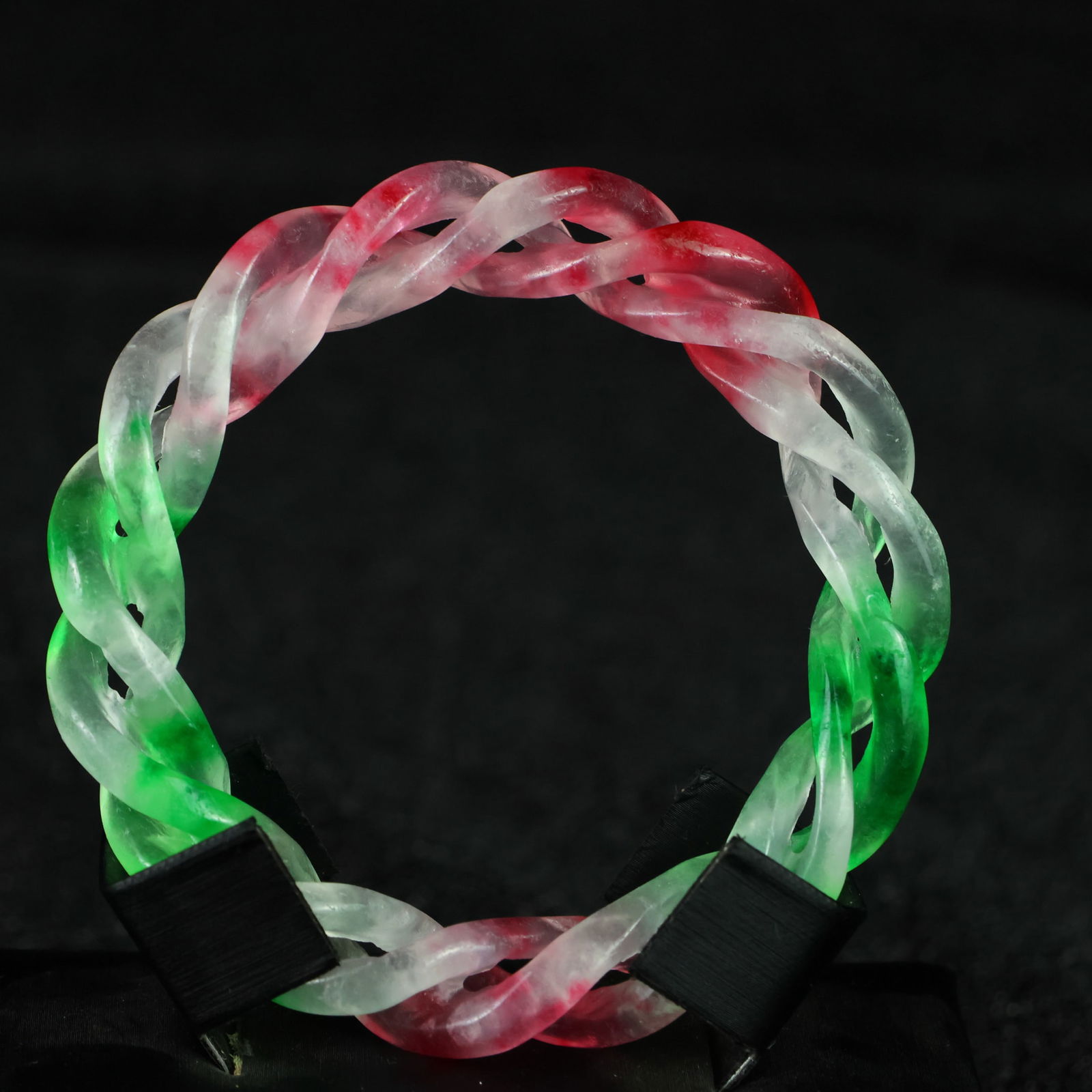 Perfectly crafted high-grade ice crystal jadeite bangle with exquisite carving.: This exquisitely carved high-grade icy jadeite bangle boasts a pure, rich, clean, and translucent base with strong fluorescence and exceptional rigidity. Its icy, luminous appearance and perfect trans