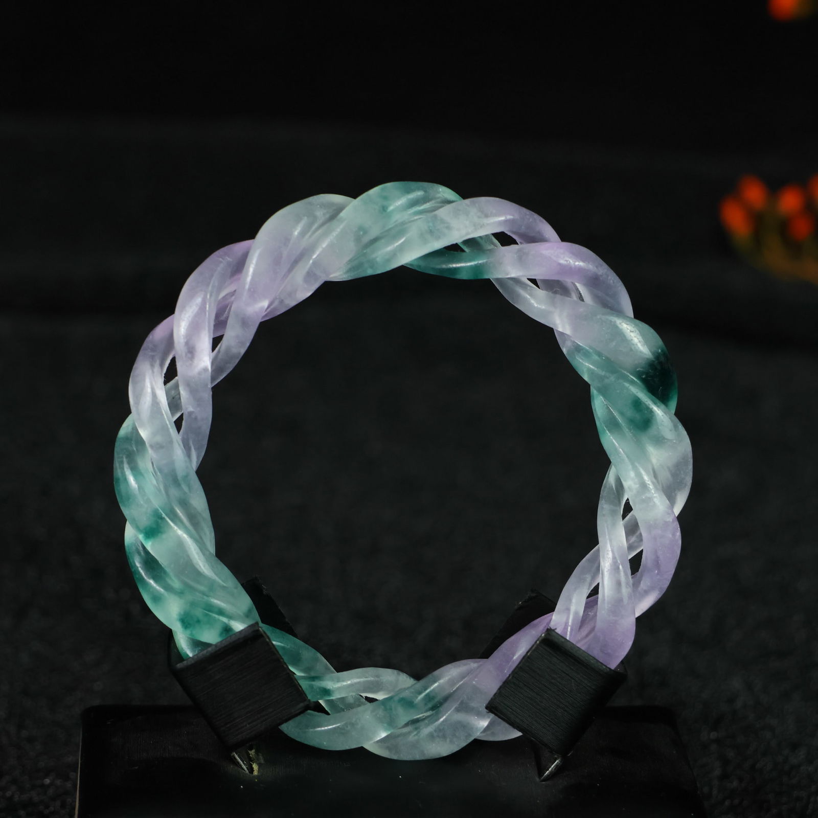 Perfectly crafted high-grade ice crystal jadeite bangle with exquisite carving.: This exquisitely carved high-grade icy jadeite bangle boasts a pure, rich, clean, and translucent base with strong fluorescence and exceptional rigidity. Its icy, luminous appearance and perfect trans