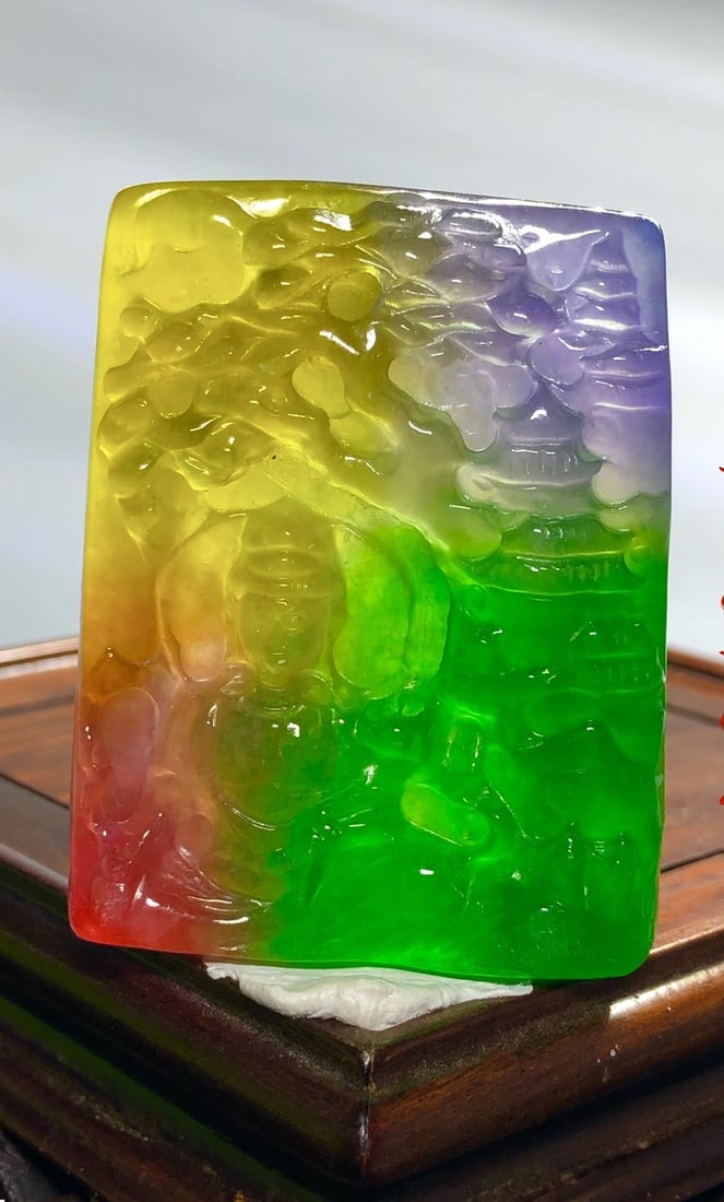 High-quality, multi-colored jadeite three-dimensional relief landscape Guanyin pendant: High-quality, multi-colored jadeite pendant with a three-dimensional relief carving of a landscape and Guanyin (Avalokitesvara) in icy blue. Provenance:Private collection, Liverpool, The United Kingdo