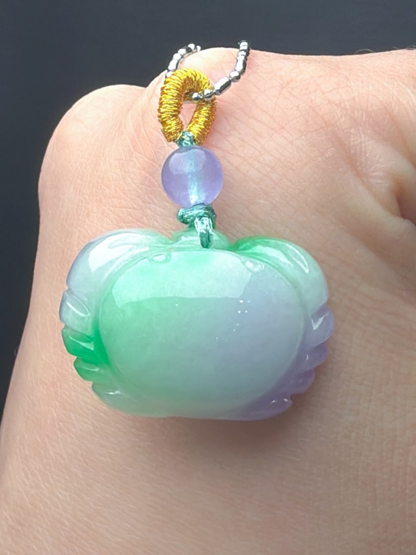 Jadeite of the glutinous type with floating green "crab" pattern: The jadeite "crab" piece, made of fine, glutinous-type jade with floating green hues, is delicately carved, thick, and full. Provenance:Private collection, Liverpool, The United Kingdom. Our cooperati