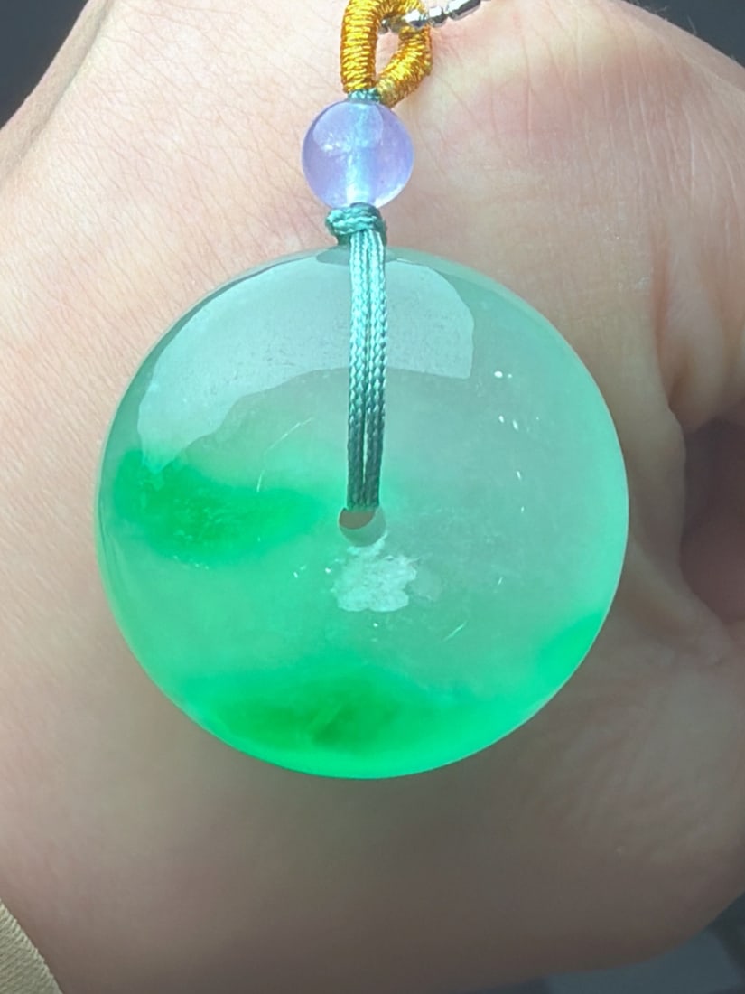 Jadeite Icy Green Floating Green Safety Buckle Bread Buckle: Jadeite icy green floating green safety buckle/bread buckle, icy and translucent, finely carved, thick and full, top-quality jadeite. Provenance:Private collection, Liverpool, The United Kingdom. Our