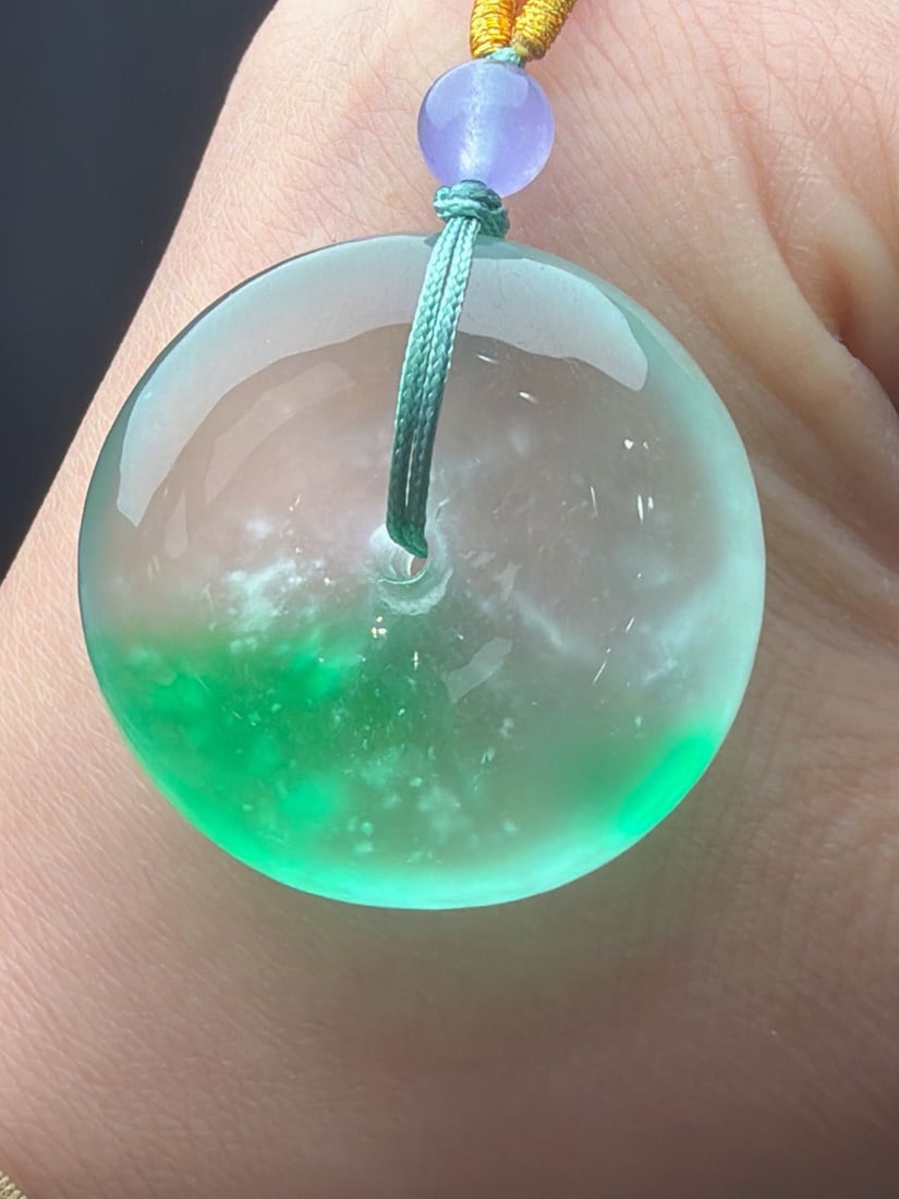 Jadeite Icy Green Floating Green Safety Buckle Bread Buckle: Jadeite icy green floating green safety buckle/bread buckle, icy and translucent, finely carved, thick and full, top-quality jadeite. Provenance:Private collection, Liverpool, The United Kingdom. Our