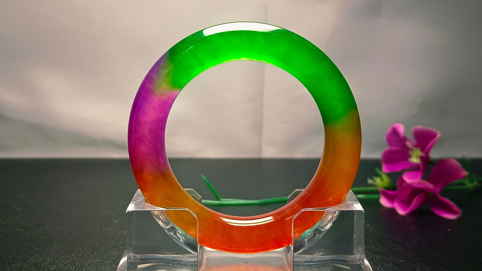 Dragon Stone Type Multicolored Jadeite Bangle: Dragon Stone Type Multicolored Jadeite Bangle Provenance:Private collection, Liverpool, The United Kingdom. Our cooperative logistics services provider expertly handles both domestic and global shippi