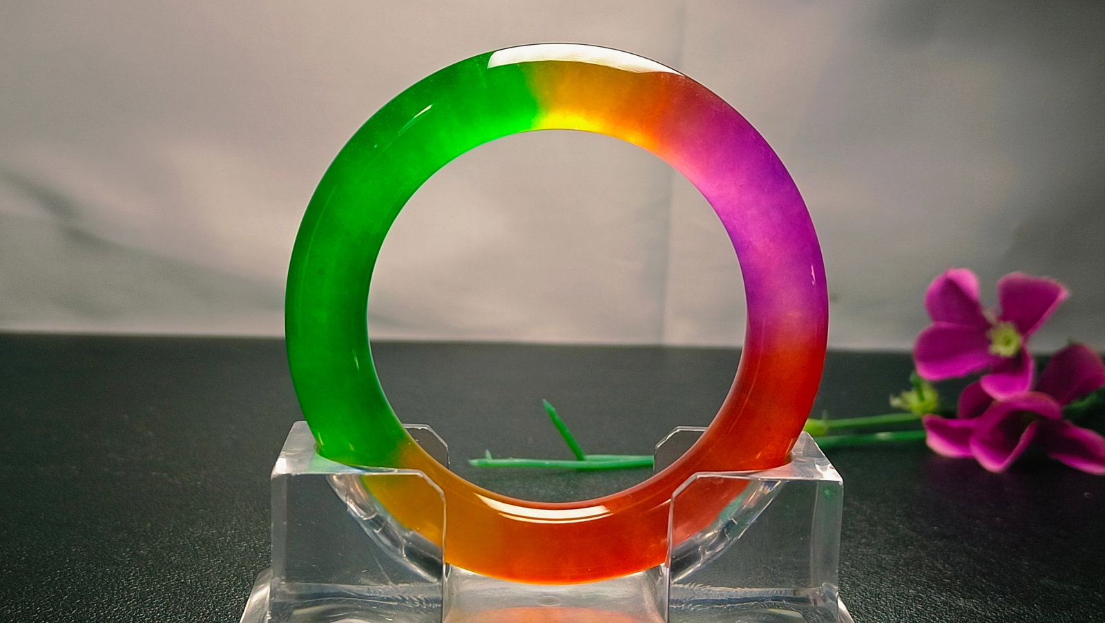 Dragon Stone Type Multicolored Jadeite Bangle: Dragon Stone Type Multicolored Jadeite Bangle Provenance:Private collection, Liverpool, The United Kingdom. Our cooperative logistics services provider expertly handles both domestic and global shippi
