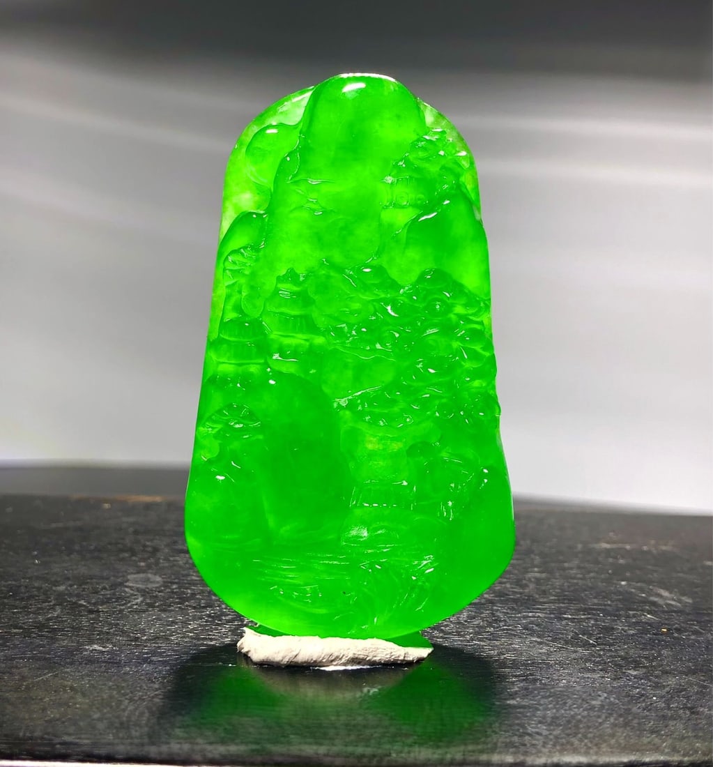 Imperial Green High-Ice Jadeite Landscape Pendant: Imperial Green High-Ice Jadeite Landscape Pendant. Provenance:Private collection, Liverpool, The United Kingdom. Our cooperative logistics services provider expertly handles both domestic and global s
