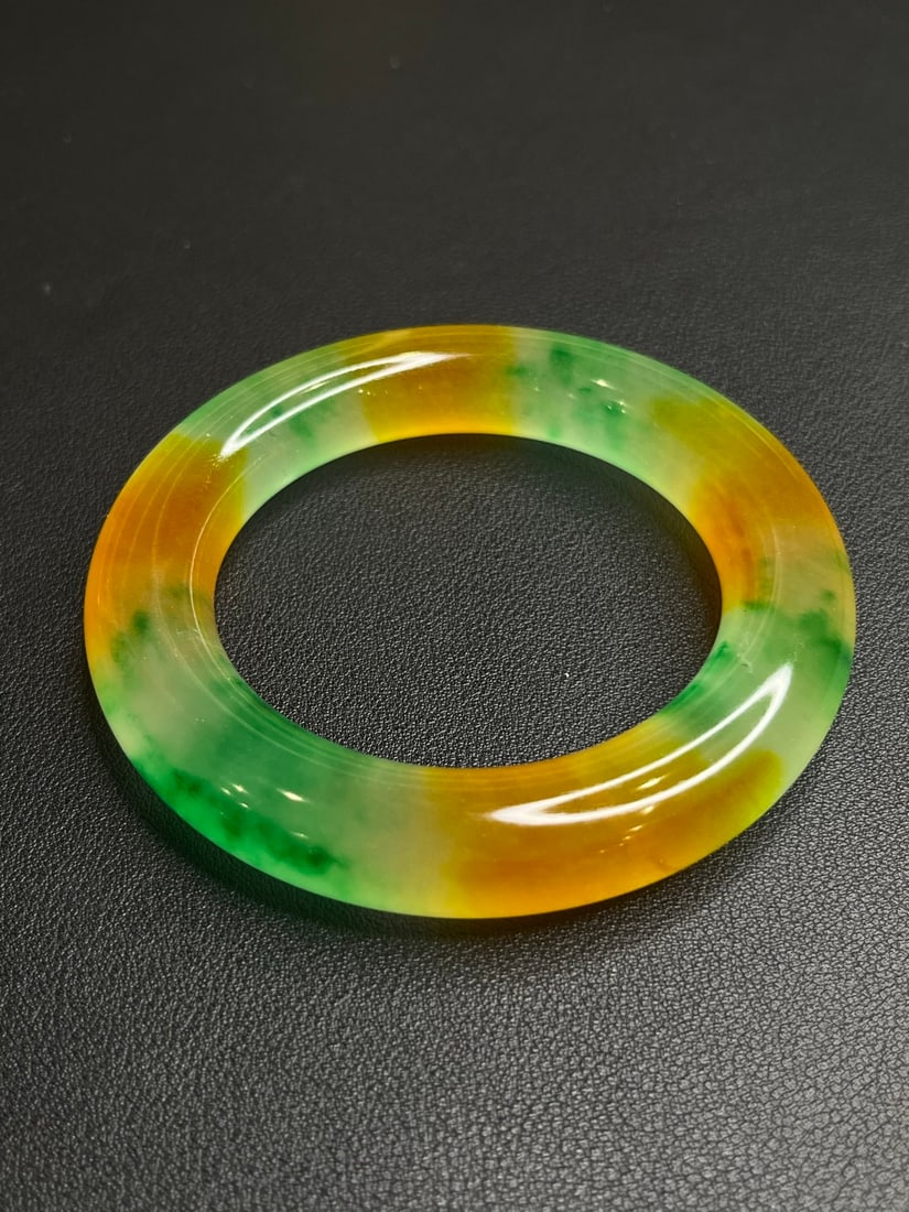 High-quality icy yellow-green jadeite bangle (1 of 5)