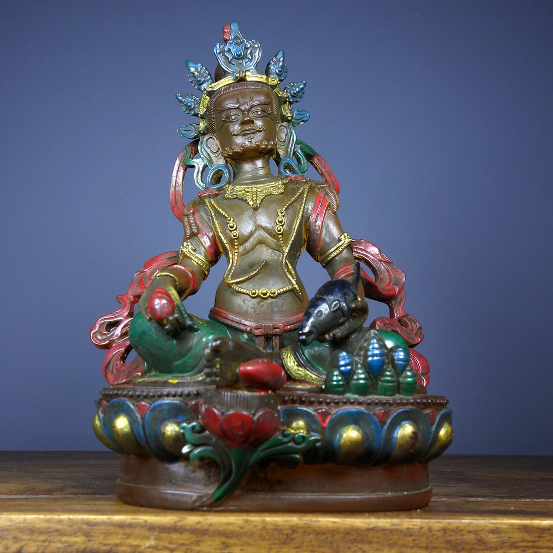 Old Collection of Ancient Gilded Glass Buddha Statue of Yellow Jambhala: An antique gilt-glass Buddha statue of Yellow Jambhala, crafted using traditional techniques. Dimensions: Length 24cm, Width 12cm, Height 23.5cm. Weight: 2320g. Provenance:Private collection from a pr