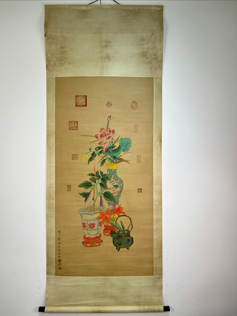 A collaborative work by Zou Yigui and Lang Shining, featuring a hand-painted lotus flower and: A hand-painted lotus and antique motif painting, attributed to Zou Yigui and Lang Shining, on paper, hanging scroll. Painting dimensions: 203 x 78 cm; painting core dimensions: 233 x 66 cm. Provenance