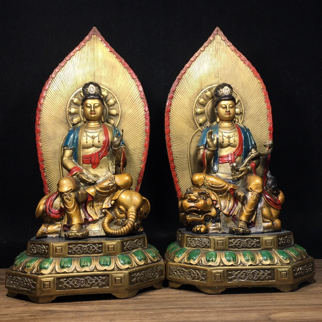 A pair of pure copper painted Manjushri and Samantabhadra Bodhisattvas: A pair of pure copper painted Manjushri and Samantabhadra Bodhisattvas, each measuring 17.5 cm in length, 16.5 cm in width, and 35 cm in height, with a total weight of 5330 grams. Provenance:Private c