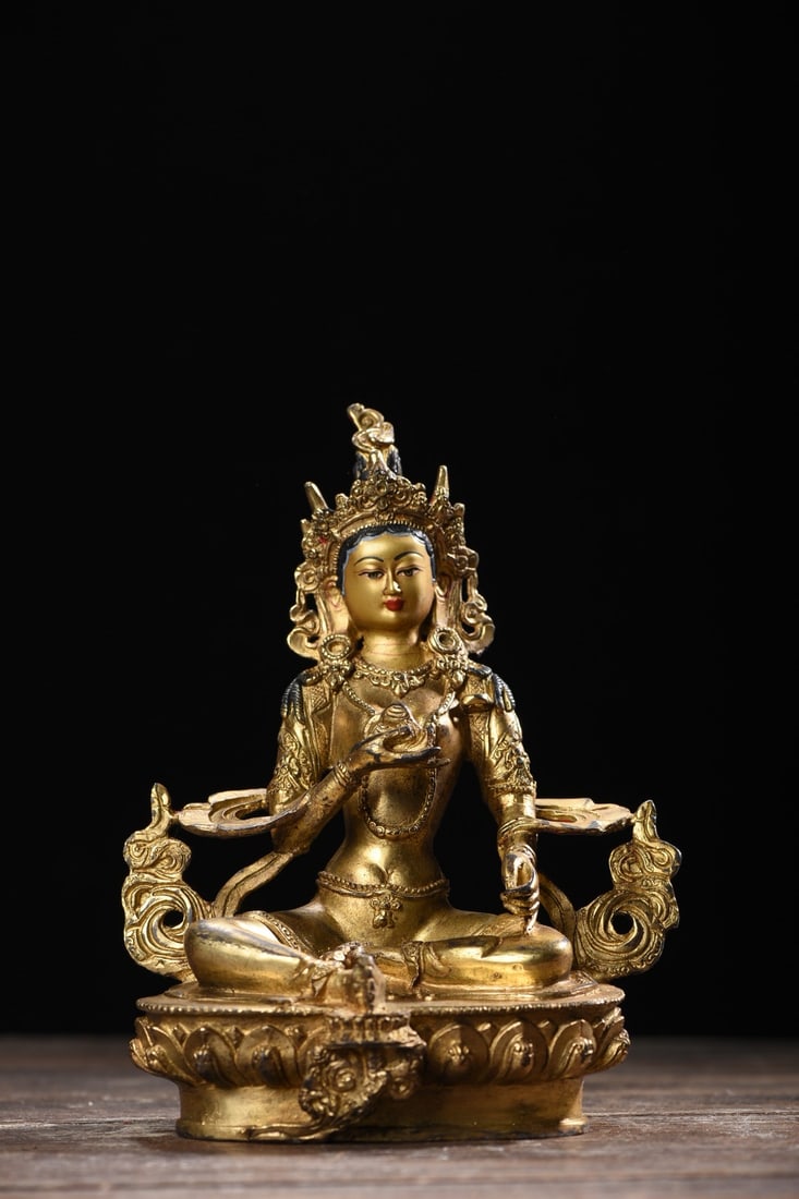 Golden Green Tara Statue: The Golden Green Tara statue is 21cm high, 16cm wide, 10cm thick, and weighs 1033 grams. Provenance:A notable private collector in Kensington, London, United Kingdom. Our cooperative logistics service