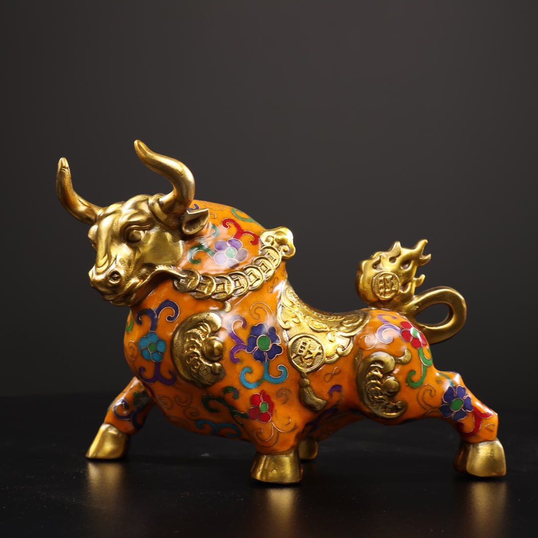 Collector's item: a pure copper cloisonne ox ornament with a golden ox design. (1 of 9)