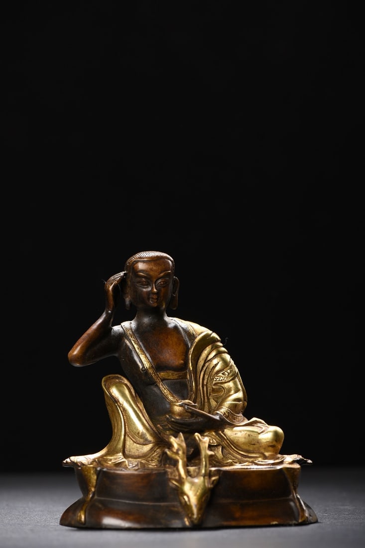 Golden Milarepa statue: The statue of Milarepa measures 13.5cm in height, 12.5cm in width, and 8.5cm in thickness, and weighs 935 grams. Provenance:from the collection of George Stopher, Kent, purchased from P&M Waldo Antiqu