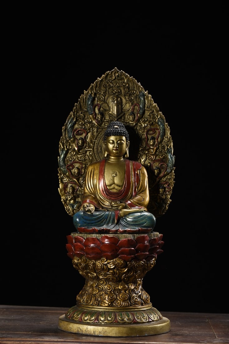Copper-painted Shakyamuni Buddha statue: A bronze painted Shakyamuni Buddha statue, 36cm high, 16cm wide, and weighing 3025 grams. Provenance:from the collection of George Stopher, Kent, purchased from P&M Waldo Antiques, London. Our coopera