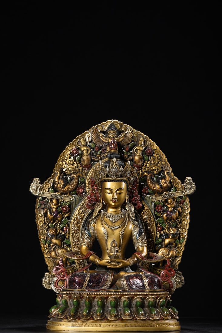 Copper Painted Longevity Buddha Statue: A bronze painted statue of the Buddha of Longevity, 34cm high, 27cm wide, 14cm thick, and weighing 2460g. Provenance:from the collection of George Stopher, Kent, purchased from P&M Waldo Antiques, Lon