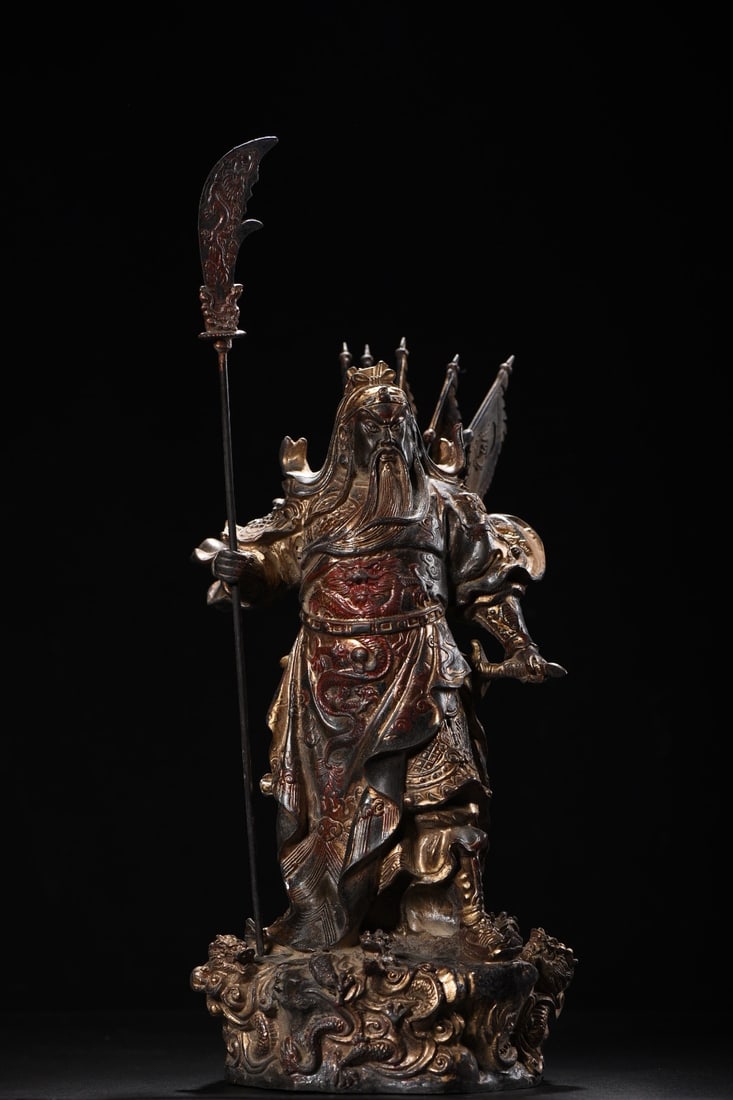 Gold-painted Nine Dragons Guan Gong Statue: A gold-painted Guan Gong statue with nine dragons, 36cm high, 18cm wide, 17cm thick, and weighing 4845 grams. Provenance:from the collection of George Stopher, Kent, purchased from P&M Waldo Antiques,