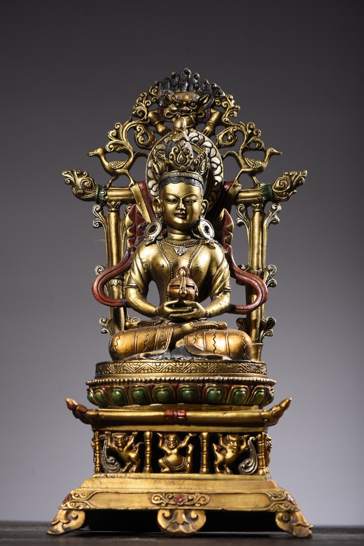 Copper Painted Statue of Amitabha Buddha: A bronze painted Amitayus Buddha statue, 34cm high, 17cm wide, 13cm thick, and weighing 2585 grams. Provenance:from the collection of George Stopher, Kent, purchased from P&M Waldo Antiques, London. O